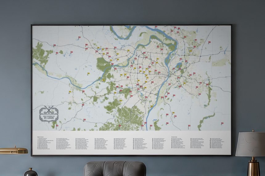 Framed St. Louis golf courses map hanging above a leather sofa in an office